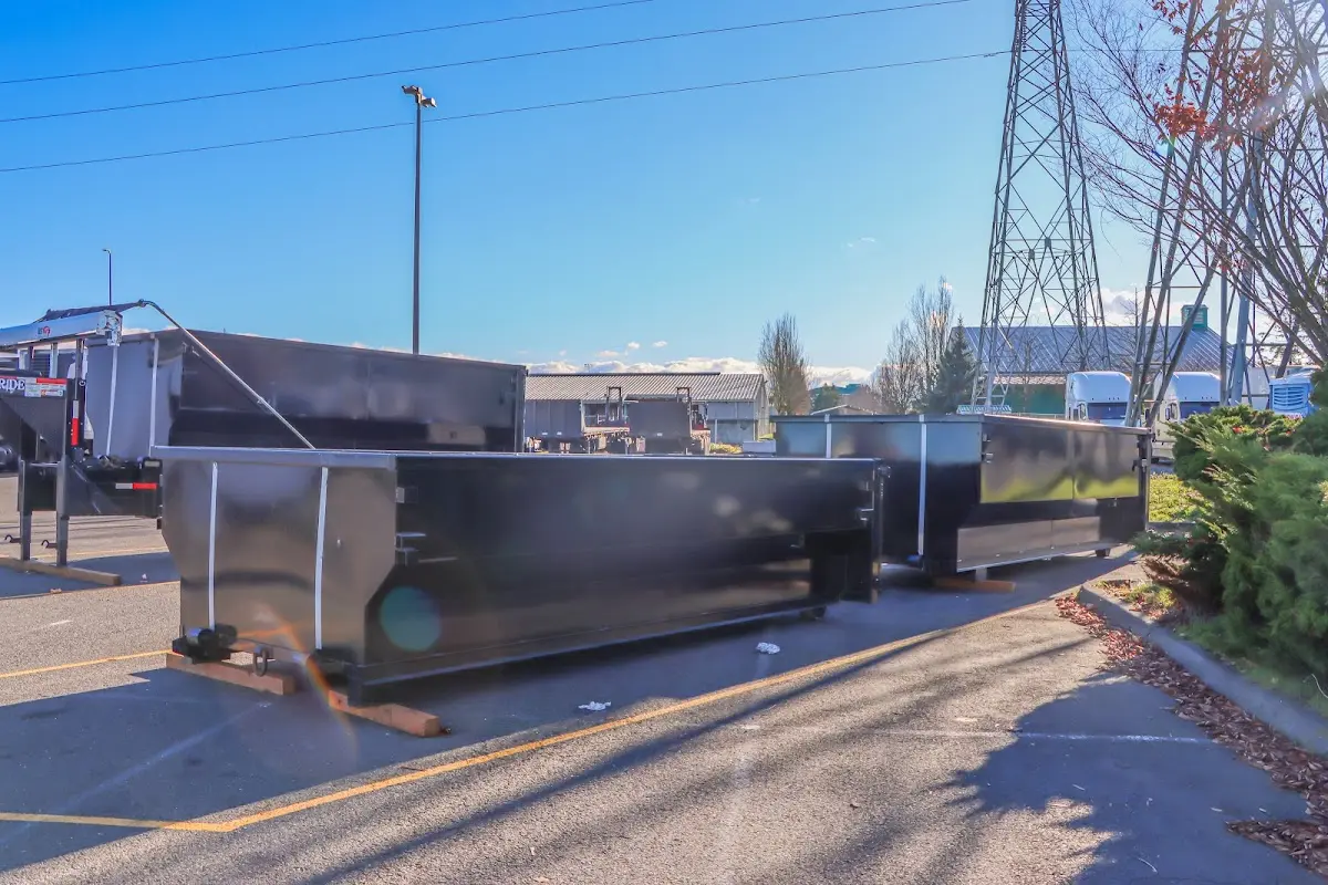 Roll-off dumpster ready for waste disposal at job site for 12 Yard Dumpster Rental in Christiana